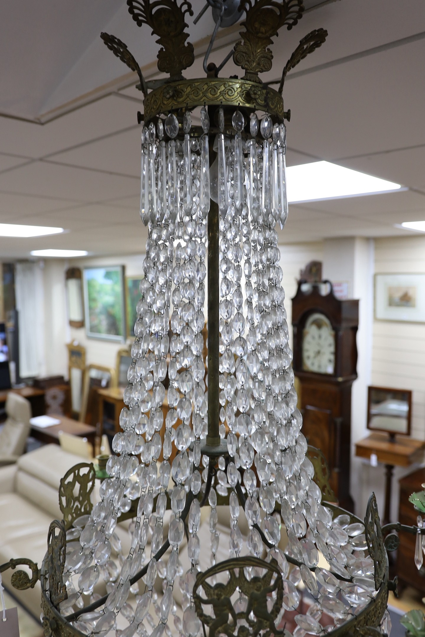 A bag chandelier with neo-classical arms